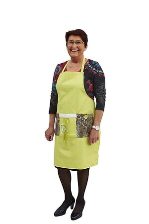 Belevingsschort in de kleur lime, wasbaar, met regelbaar halslint